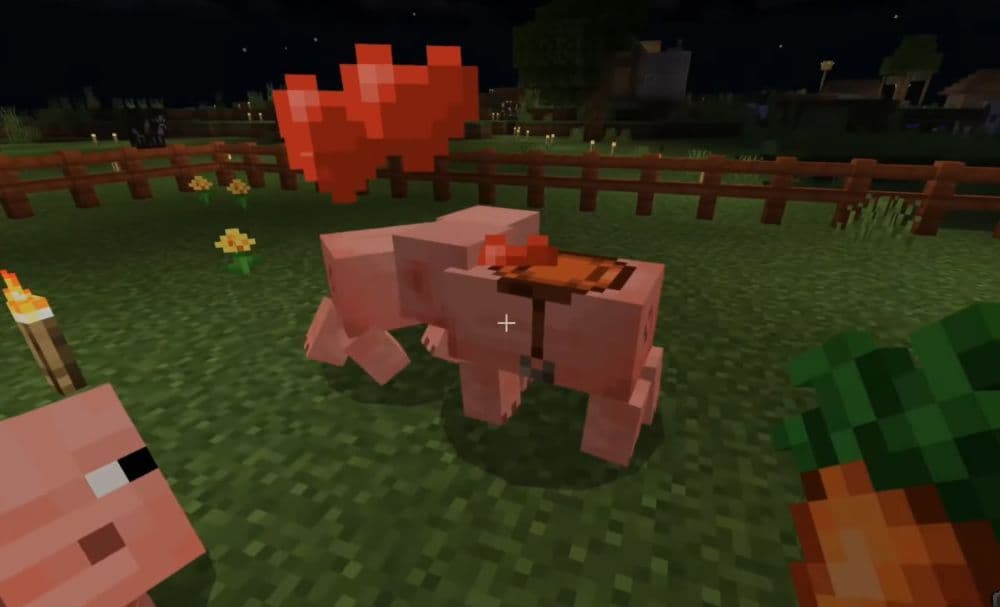Once you feed both pigs, they will start breeding as hearts will start appearing on their bodies (Image Credit: YourSixGaming on YouTube)